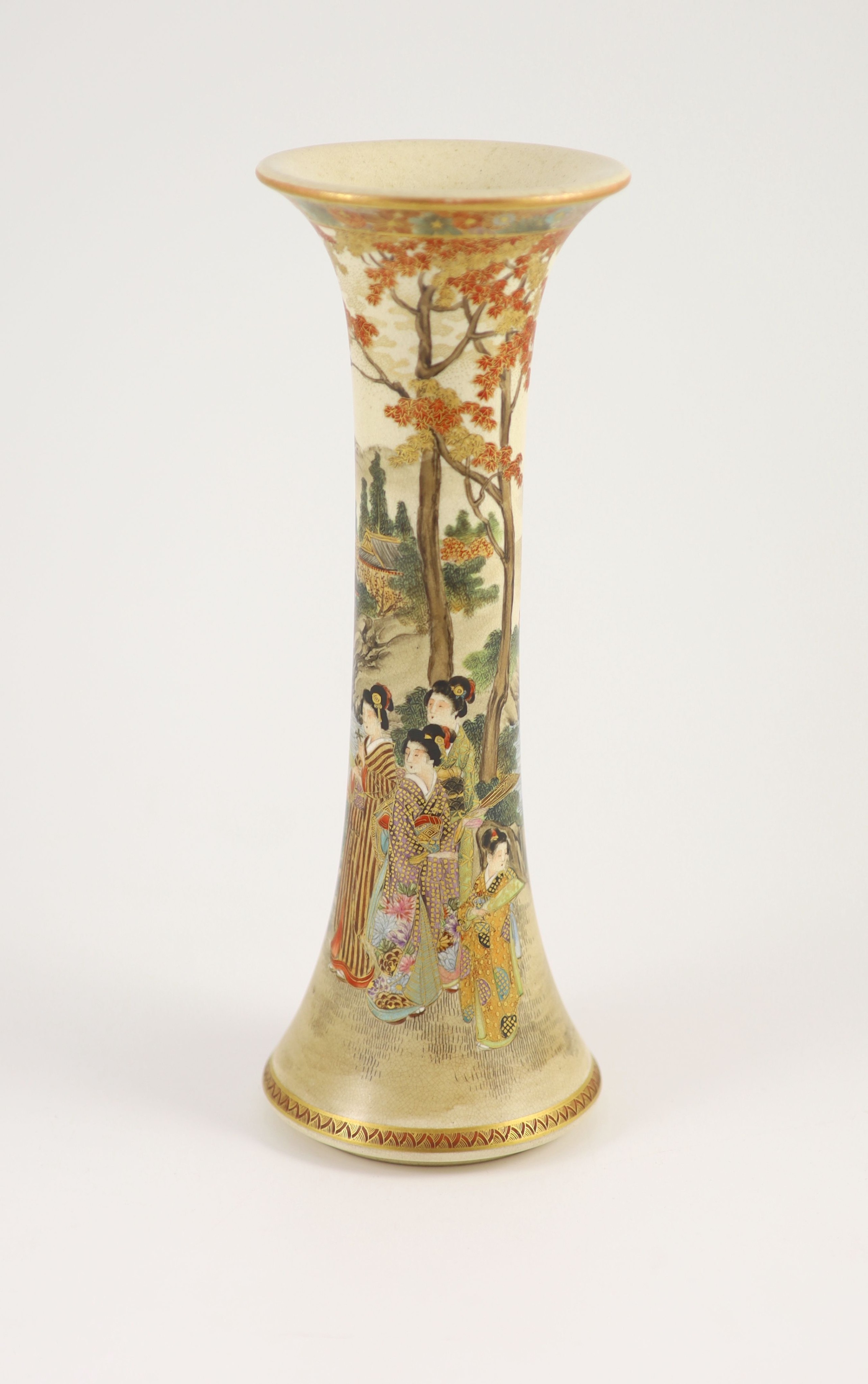 A Japanese satsuma earthenware trumpet vase by Kizan, Meiji period. The body painted and gilt with bijin and children in a lakeside landscape beneath a floral band rim, iron red and gilt signature to base. 30 cm high x 1